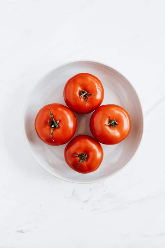 Pesto Spinach Quinoa Stuffed Tomatoes