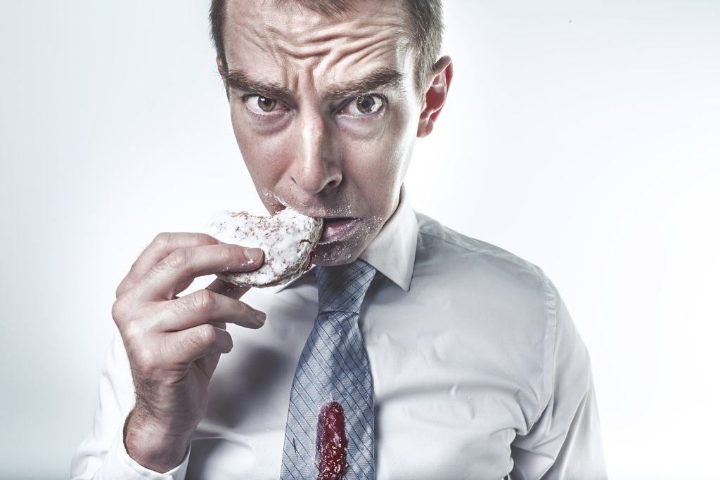 Man eating donut