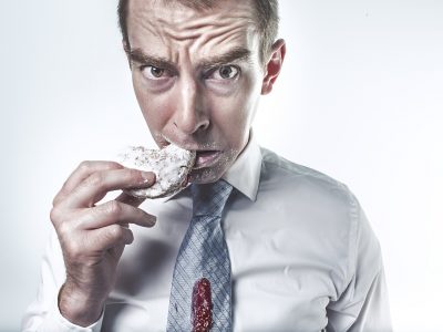 Man eating donut